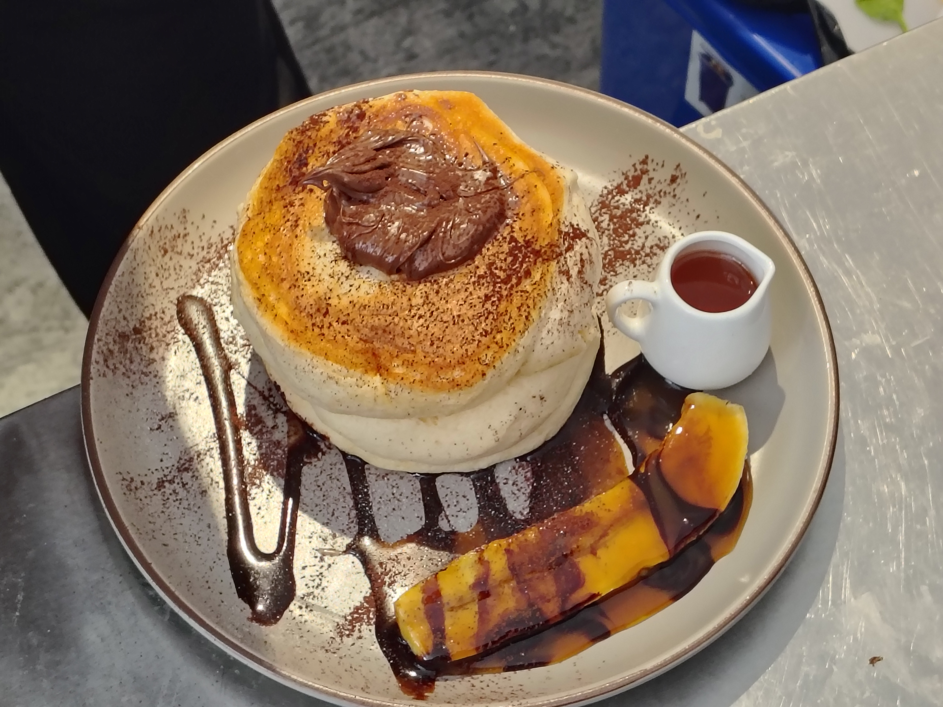 Signature soufflé pancake dessert from a hospitality client