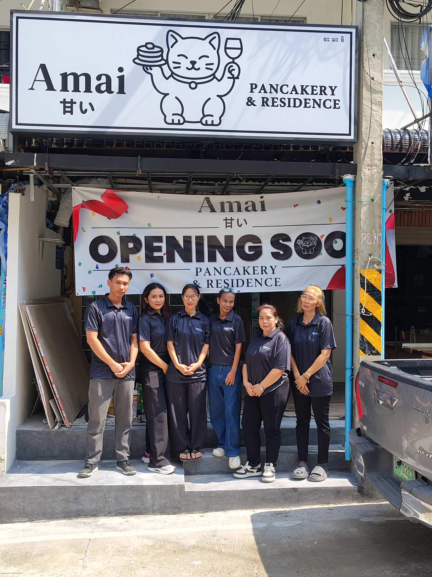 Hospitality team outside Amai Pancakery storefront on opening day